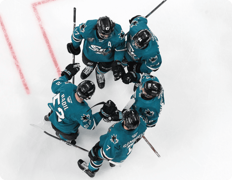 Hockey players in action, showcasing Genius Sports' ability to deliver live game data and insights